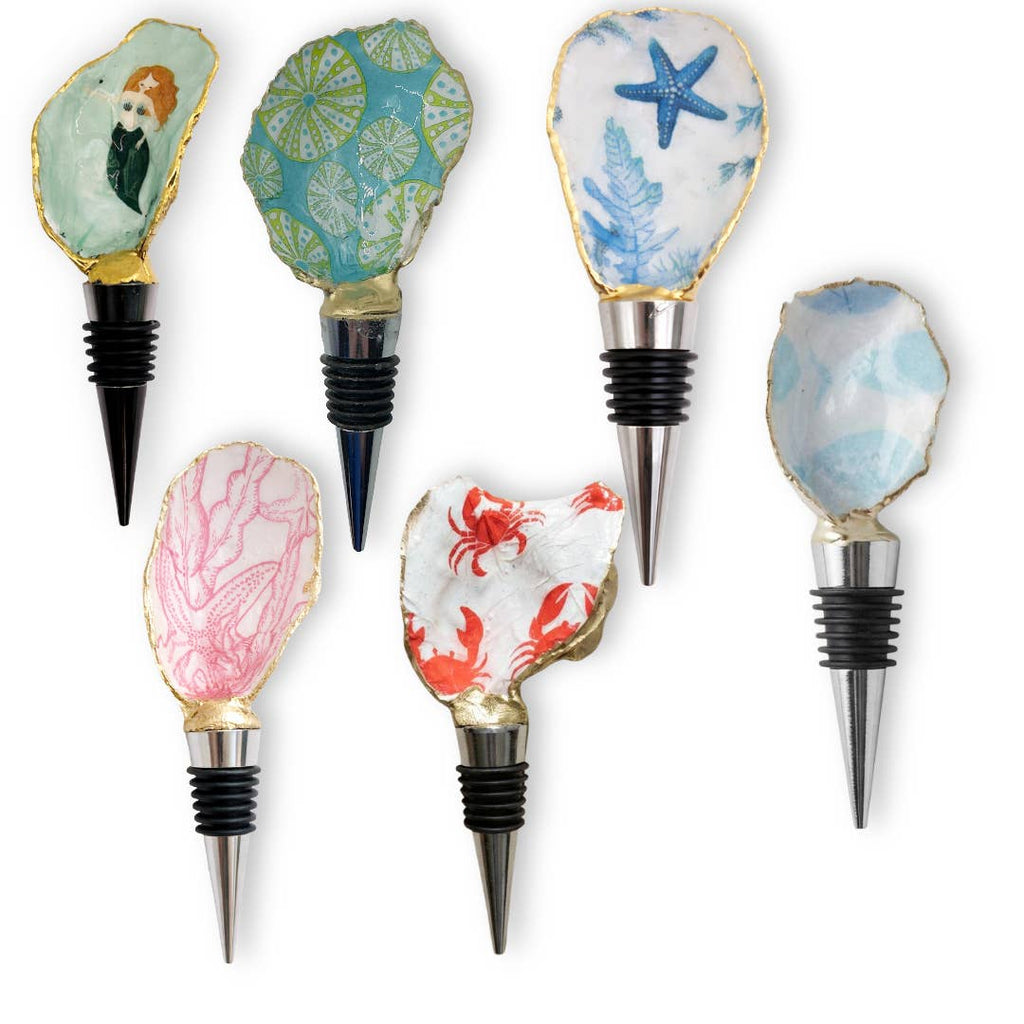 Case pack of handmade oyster shell wine stoppers for wholesale