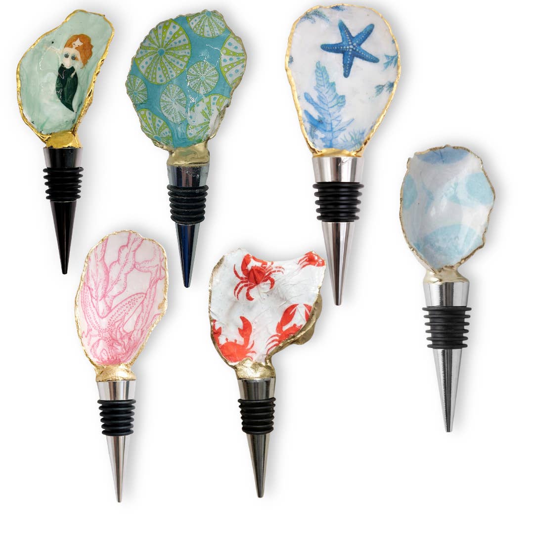 Case pack of handmade oyster shell wine stoppers for wholesale