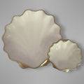 Scallop shell serving tray in coastal style with gold accents