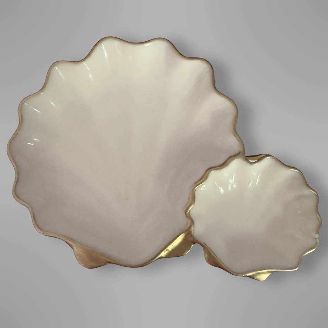 Scallop shell serving tray in coastal style with gold accents