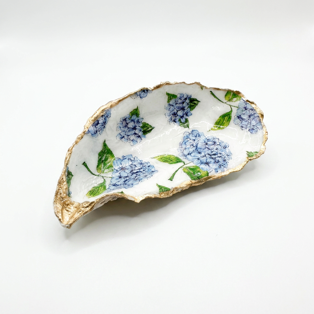 Blue hydrangea oyster shell jewelry dish with gold rim finish