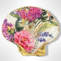 Scallop shell trinket dish with gold accents and floral motif