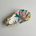 Tropical bird motif oyster shell dish with gold rim finish