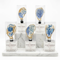 Handmade oyster shell wine stopper in blue coral reef pattern with gold finish