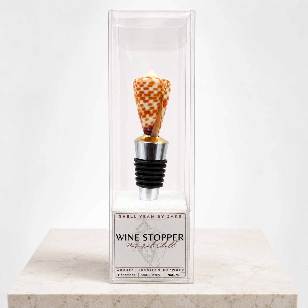 Tesselate cone shell wine stopper with gold finish