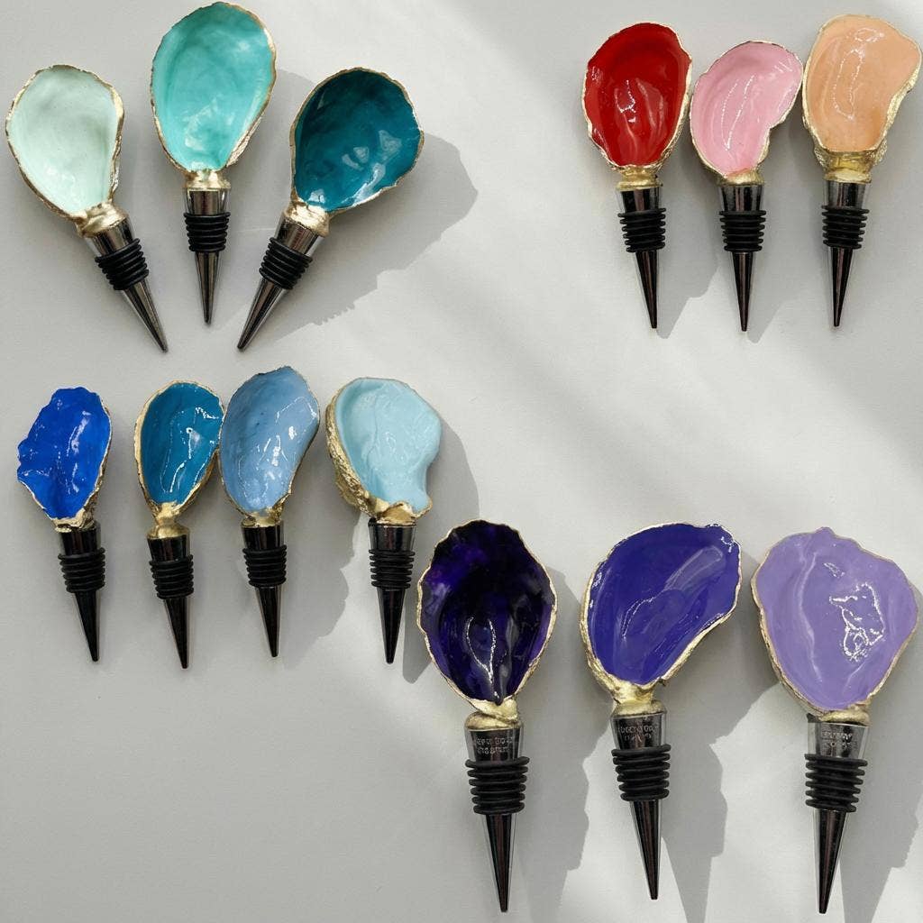 Case pack of handmade oyster shell wine stoppers for wholesale