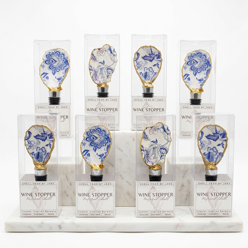 Blue and white toile pattern oyster shell wine stopper with gold finish