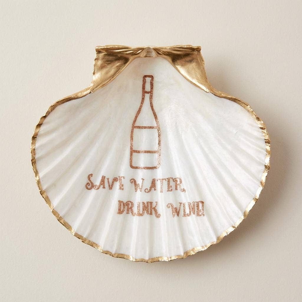 Humorous wine-themed scallop shell dish with gold accents